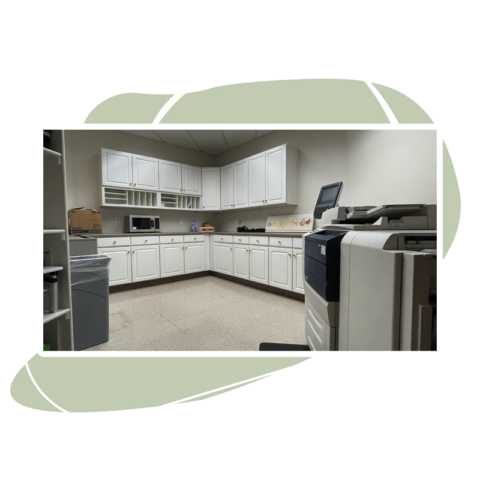Virtual office rest area with a copier, kitchen, and storage.