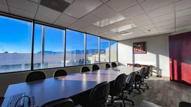 Training room at New Altitude with a mountain view and plenty of seating.
